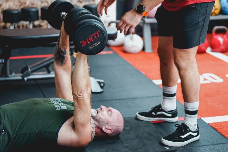 Dumbbell Floor Presses at UFIT Club Street Personal Training