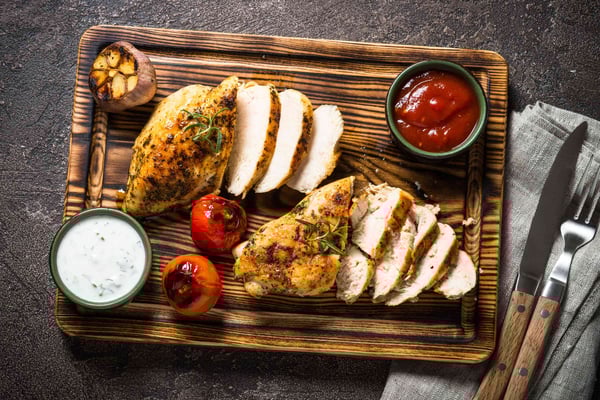 Grilled chicken steaks with sauces